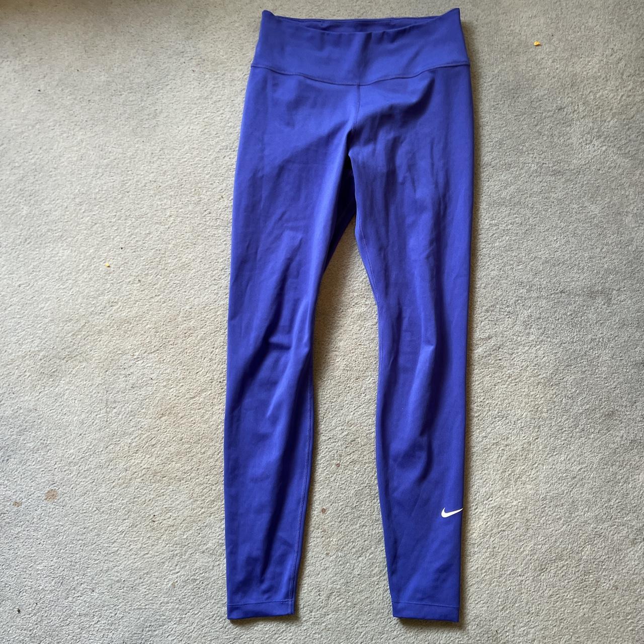 Nike Women's Dri-FIT Mid-Rise leggings in royal - Depop