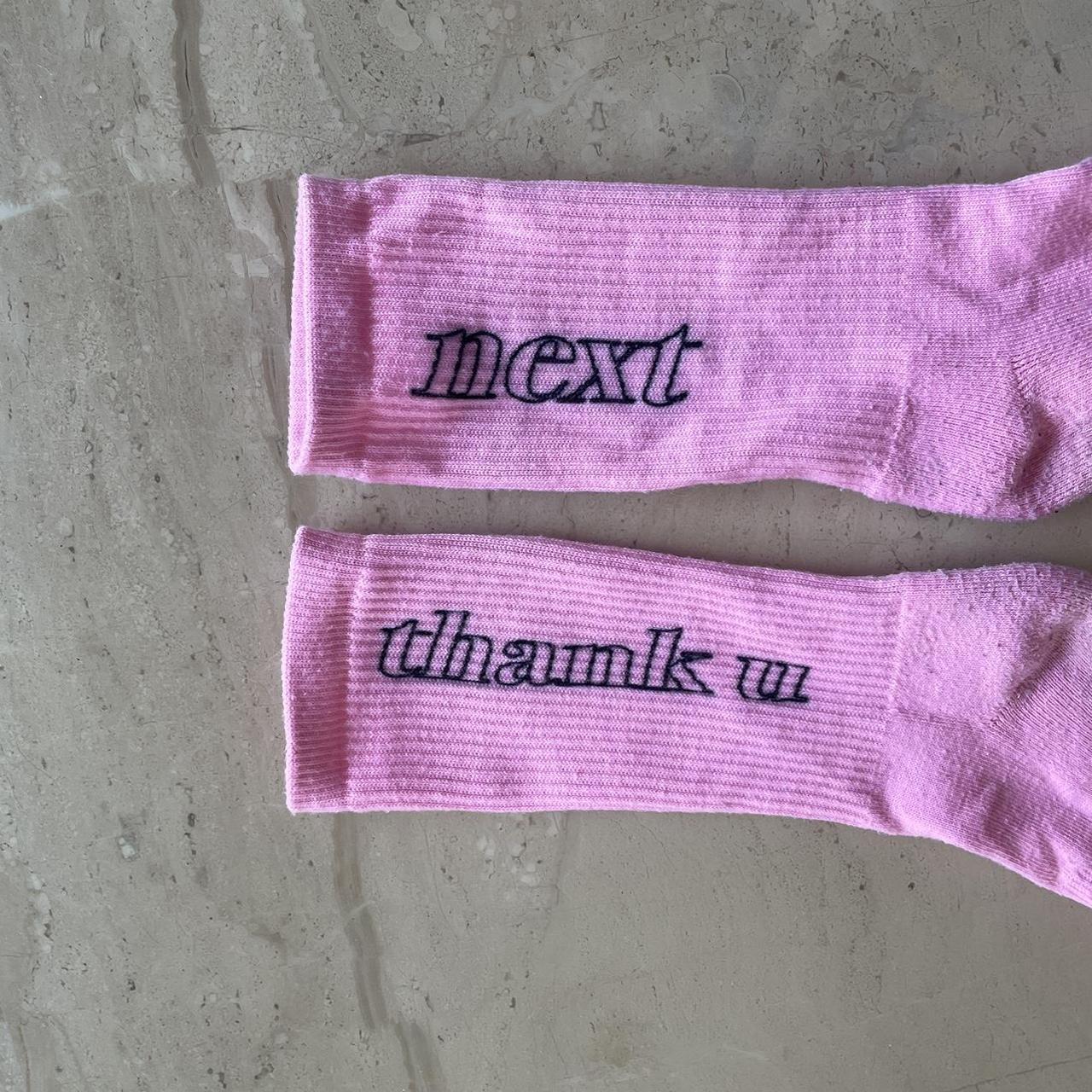 Pink next socks with black writing - super... - Depop