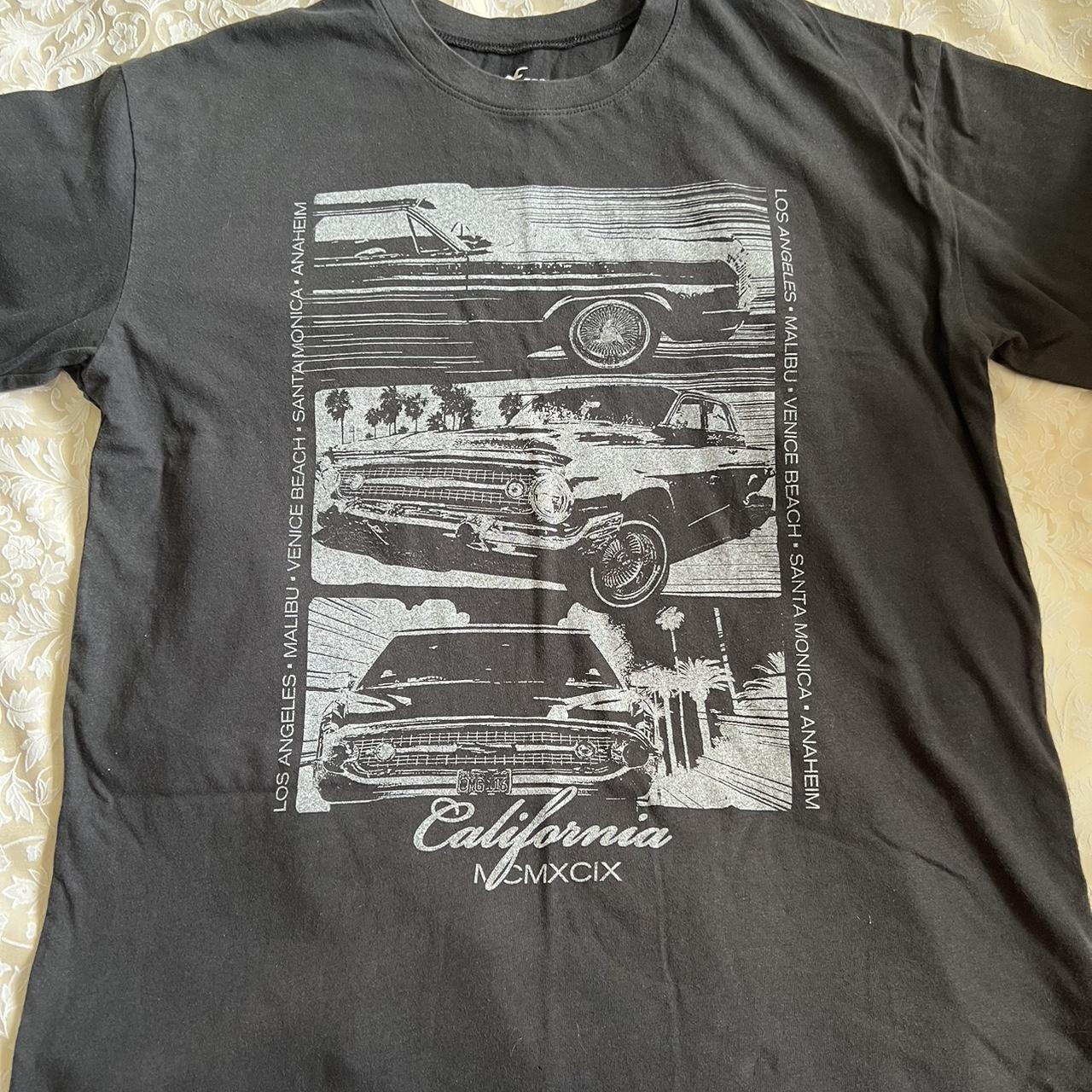 Charcoal grey graphic tee, size xs from hollister... Depop