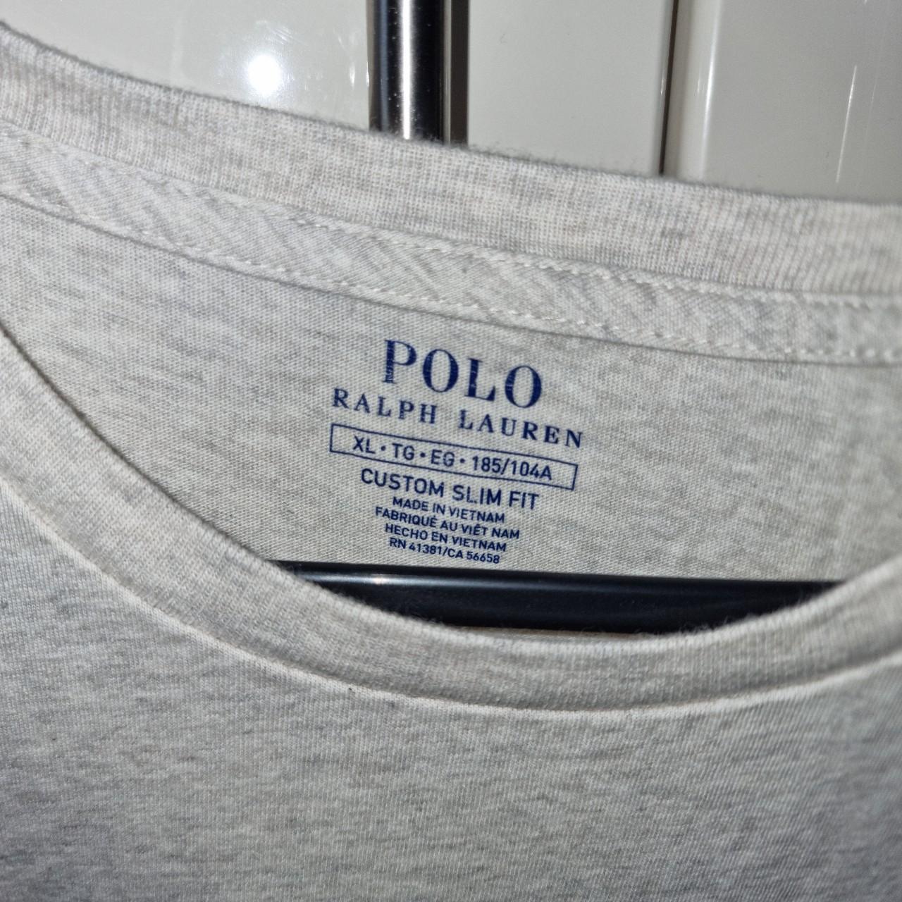 Ralph Lauren, grey/ivory t shirt. Worn but good... - Depop