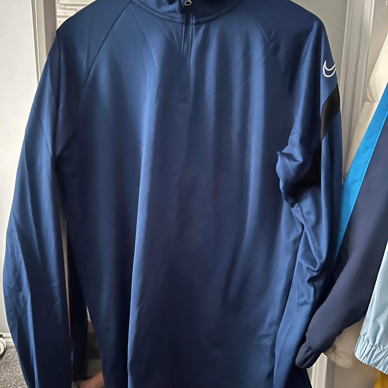 Blue Nike tracksuit - Depop