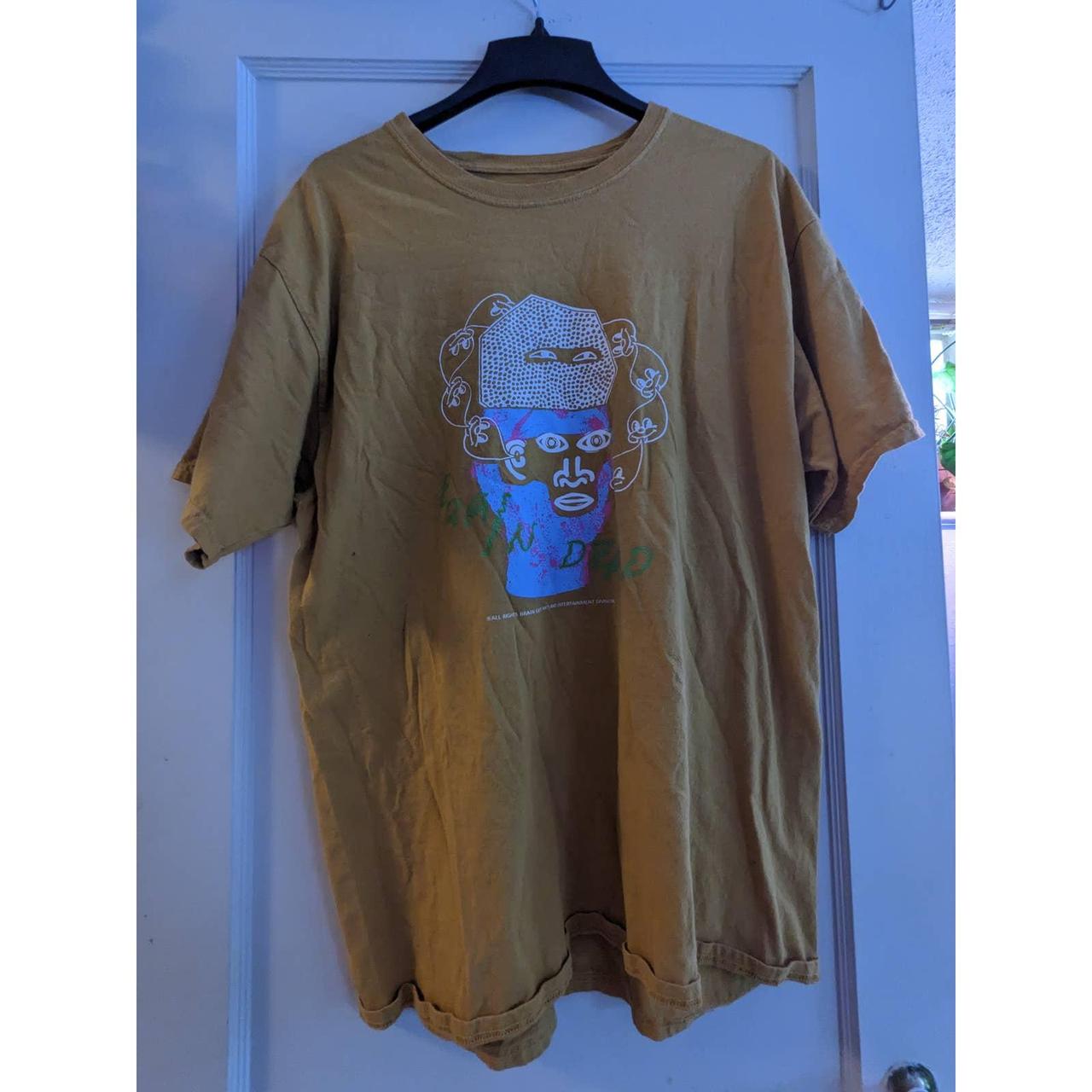 Braindead Tee. Gold color. Size tag is gone but fits...