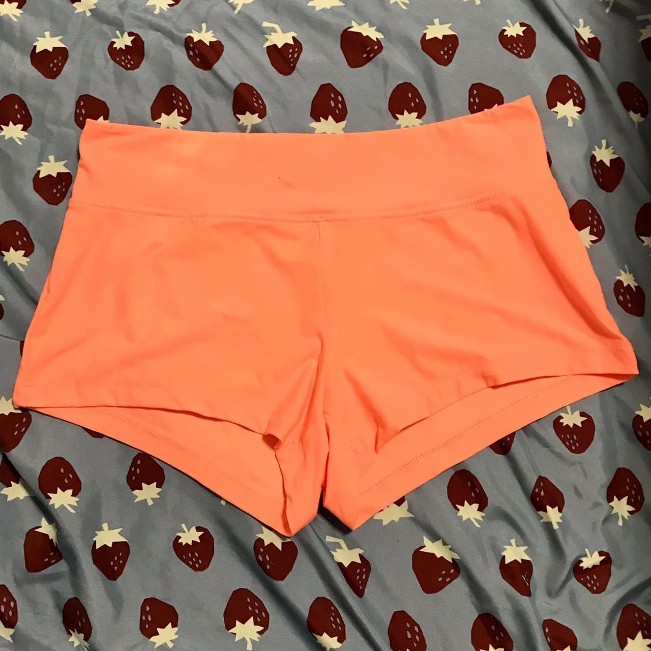 fluorescent orange mini shorts. has 2 tiny stains on... - Depop