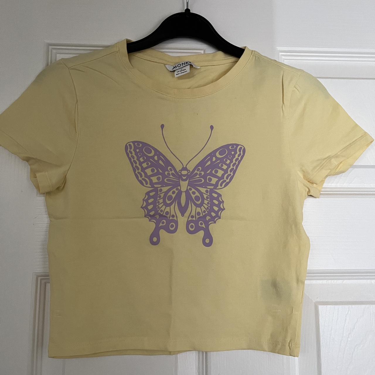 Pale yellow baby tee with pastel purple butterfly 🦋... Depop