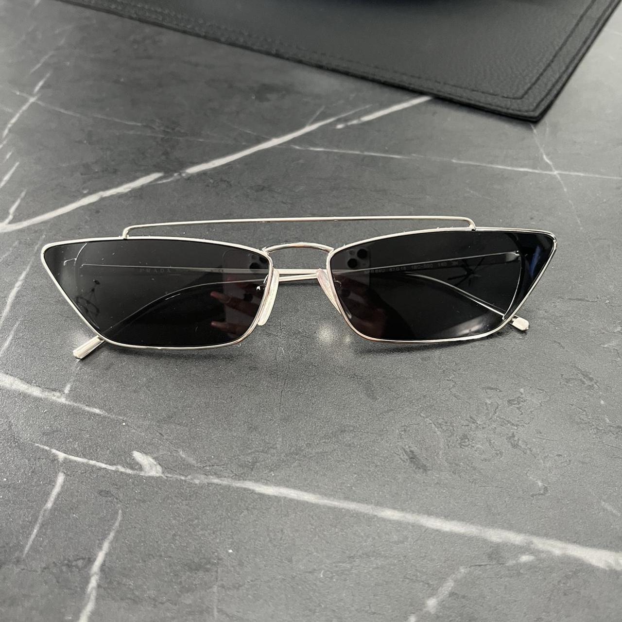 Prada Women's Black Sunglasses | Depop