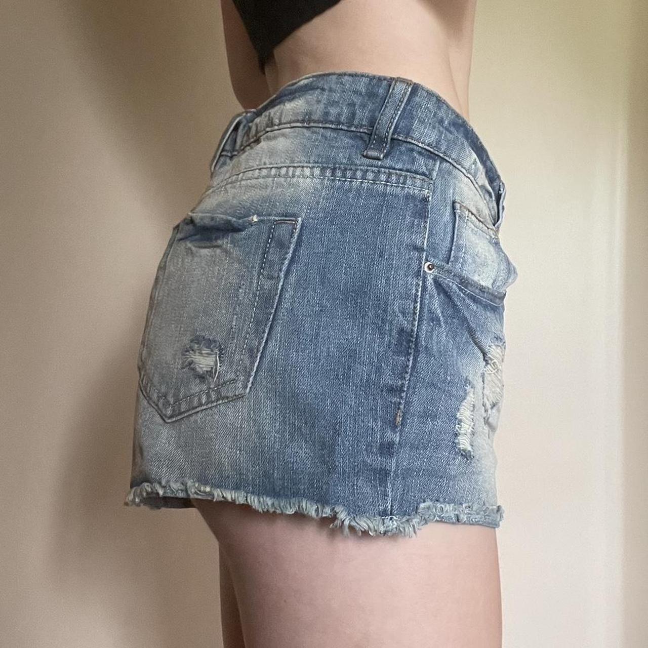 Denim mini shorts low waisted Washed and scuffed detail - Depop