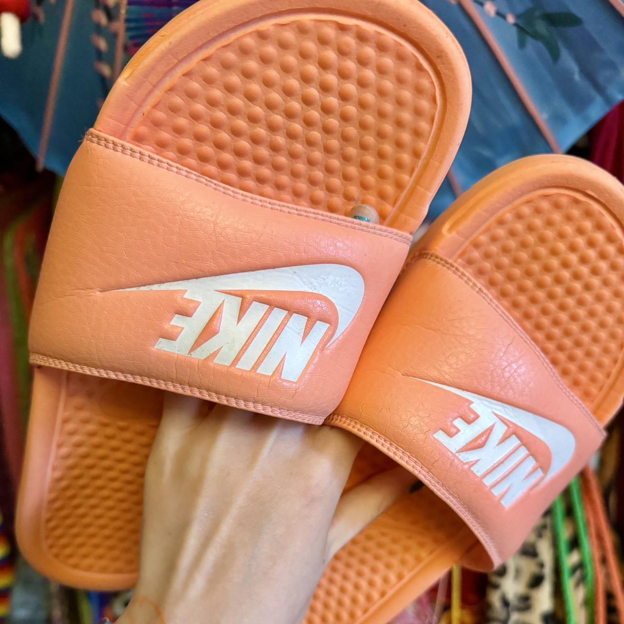 Orange nike sliders online