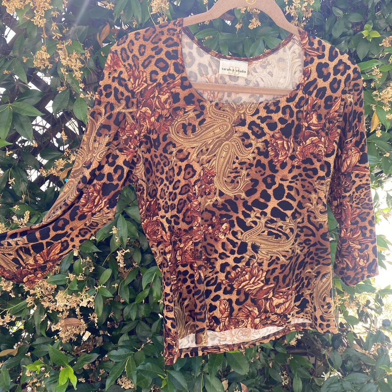 Cheetah with Louis Vuitton faux leather top. Like - Depop