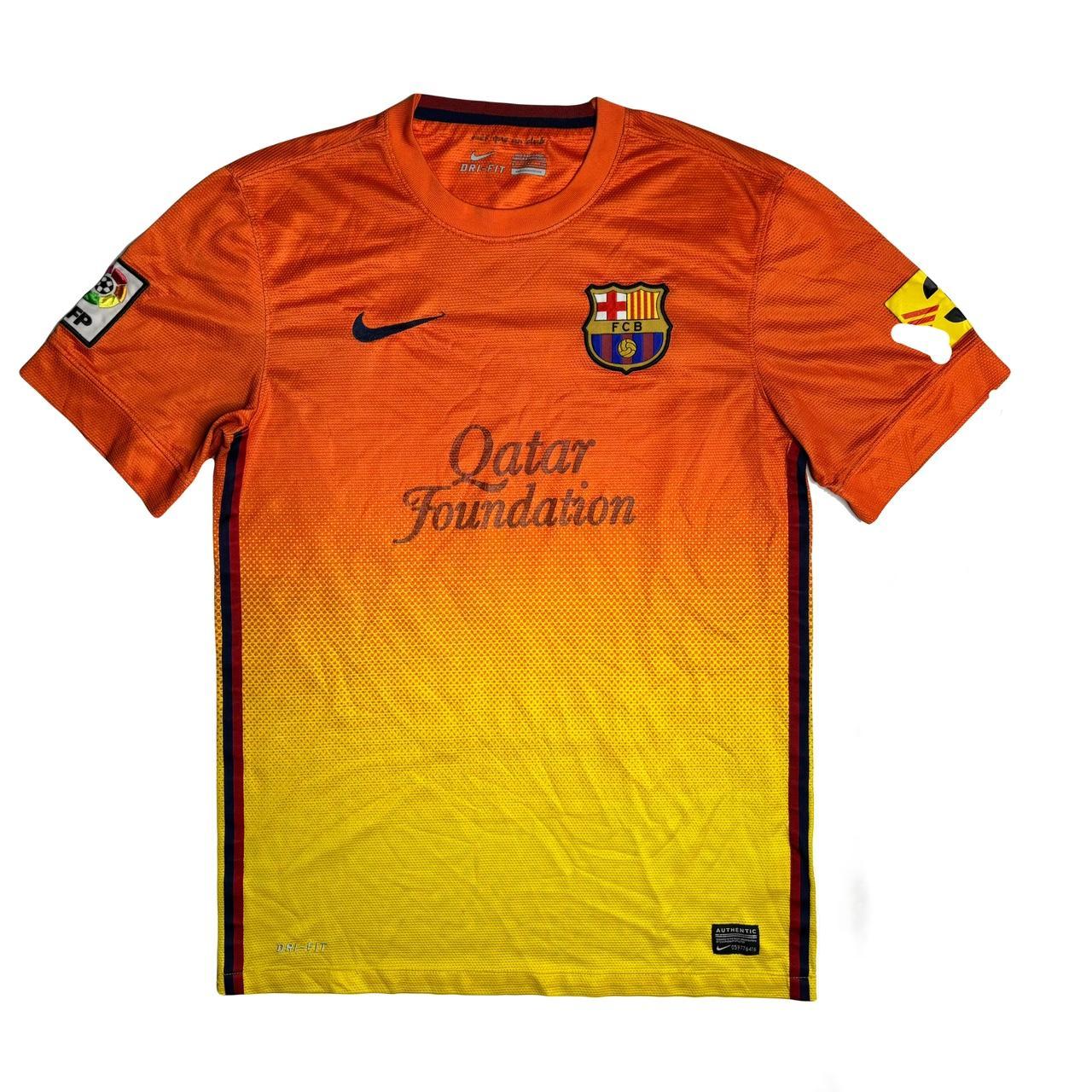 yellow and orange nike shirt