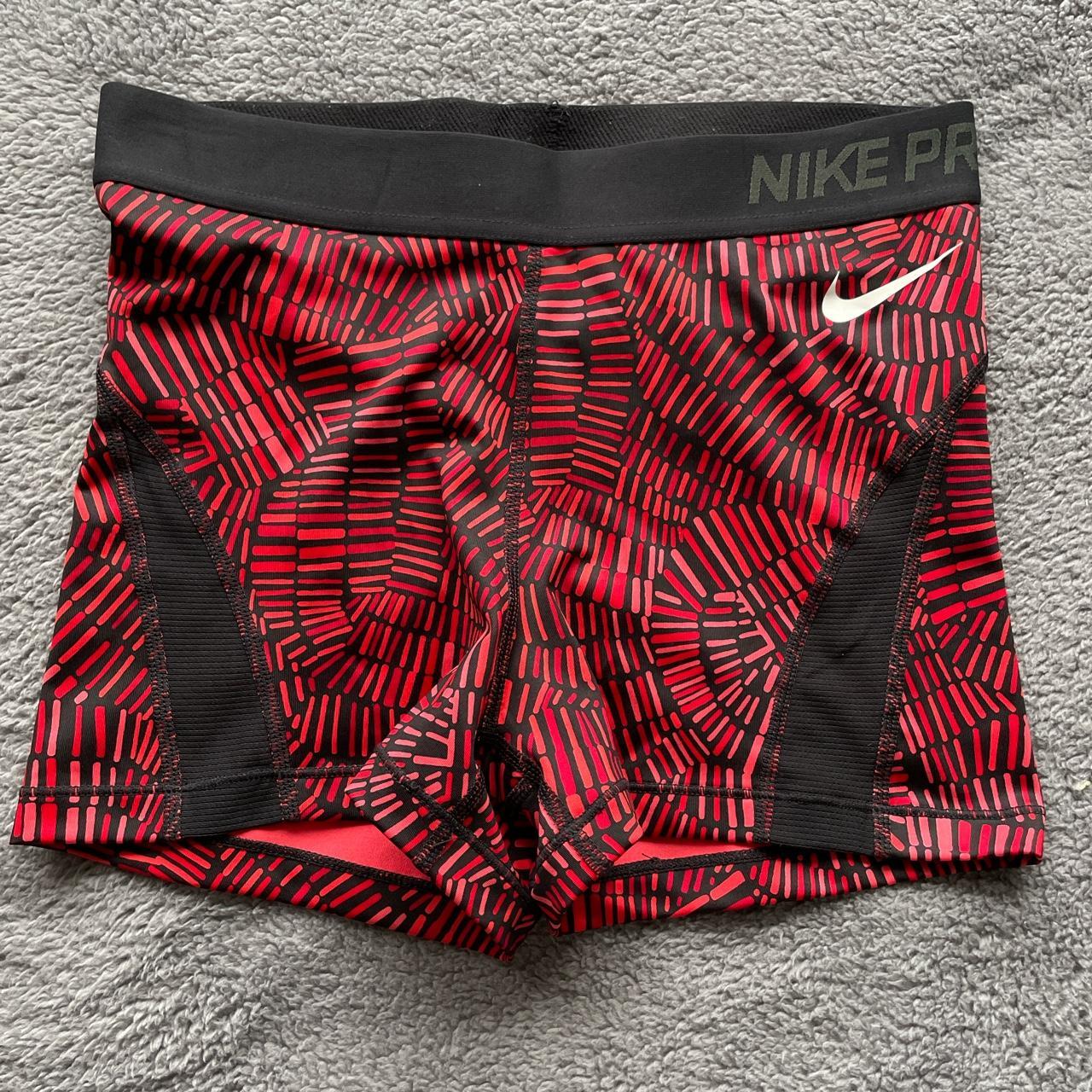 Nike Pro Red and Black Shorts Black part is... - Depop