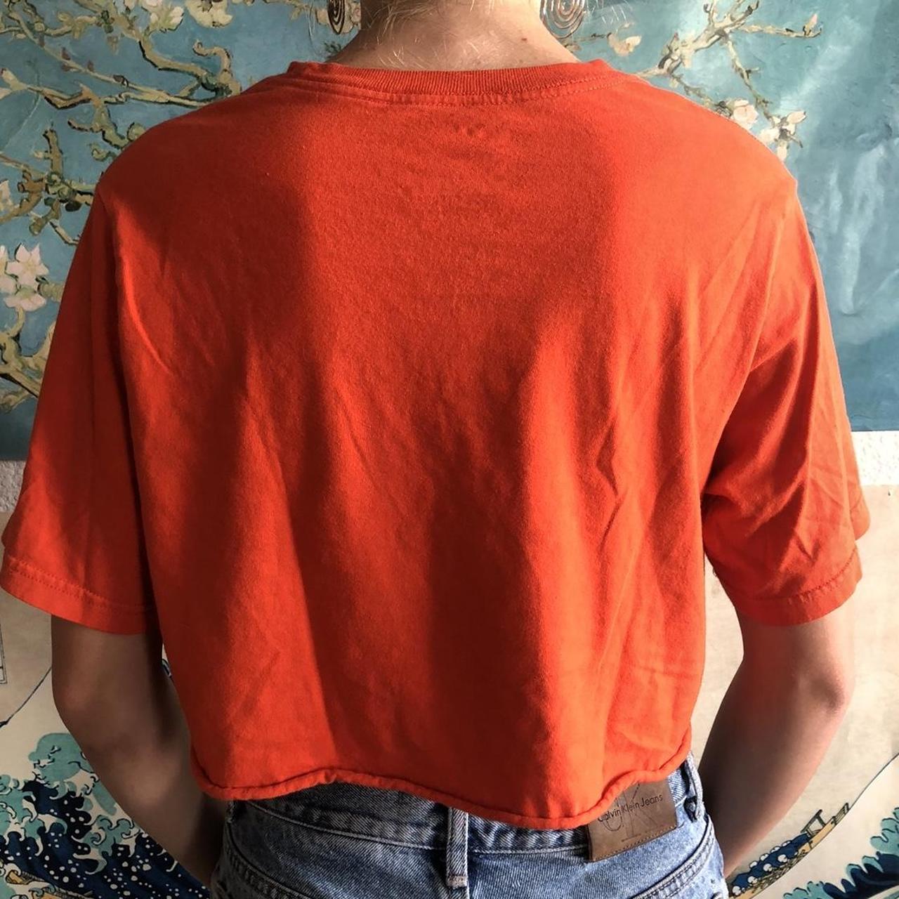 bright orange nike top