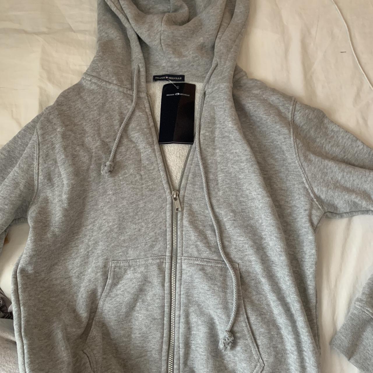 Brandy Melville grey zip up, brand new with tags,... Depop