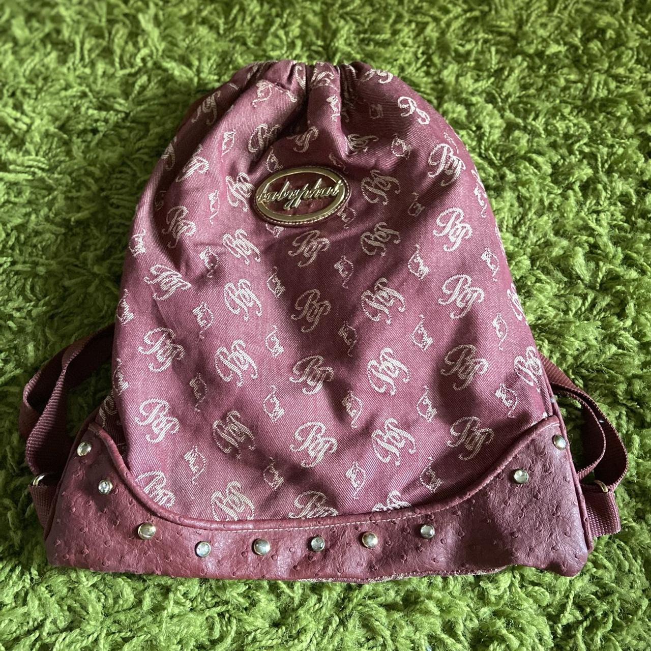 Baby phat backpack purse. Straps are... Depop