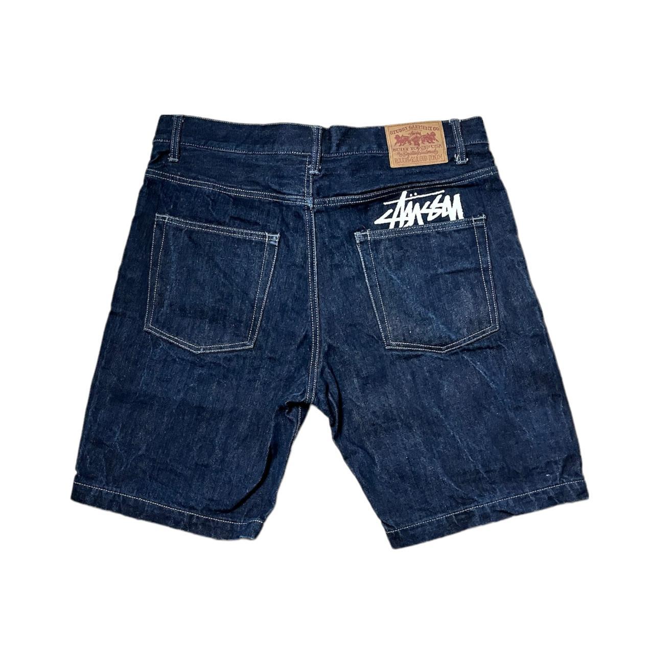 Stussy navy blue jorts with a white spellout -very... - Depop