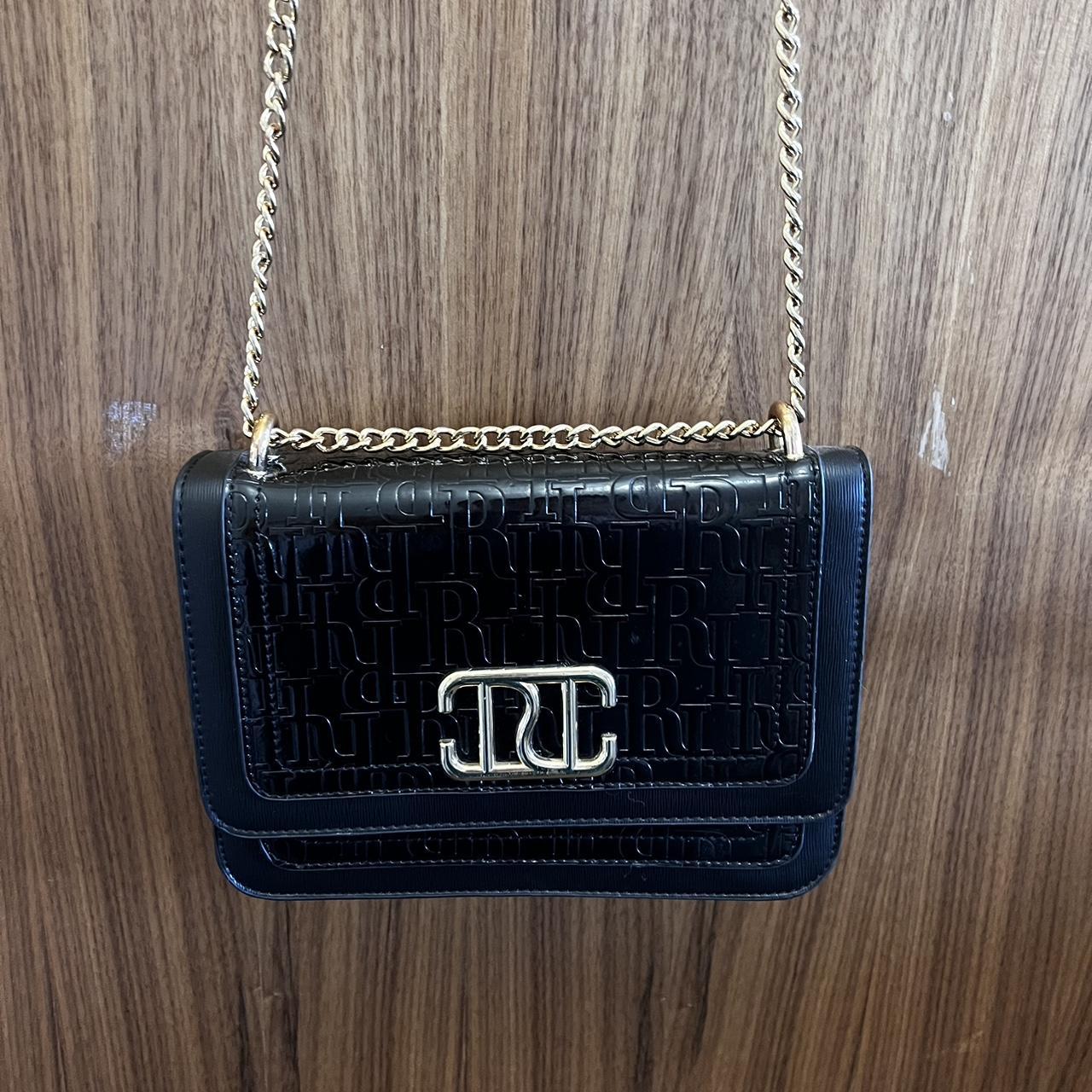 River island black patent cross body bag with gold... Depop