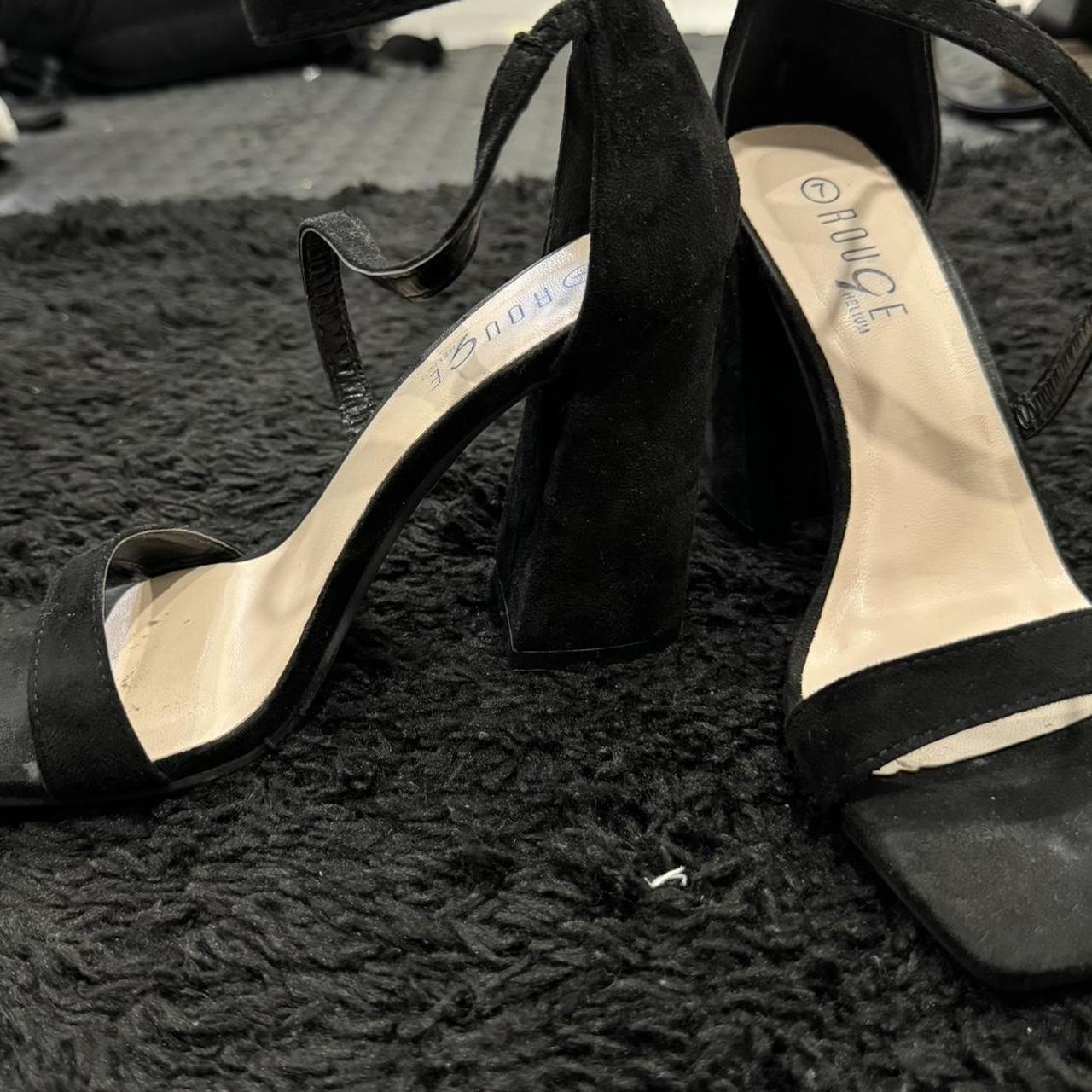 Black heels with straps. 4 inch thick heel. fits