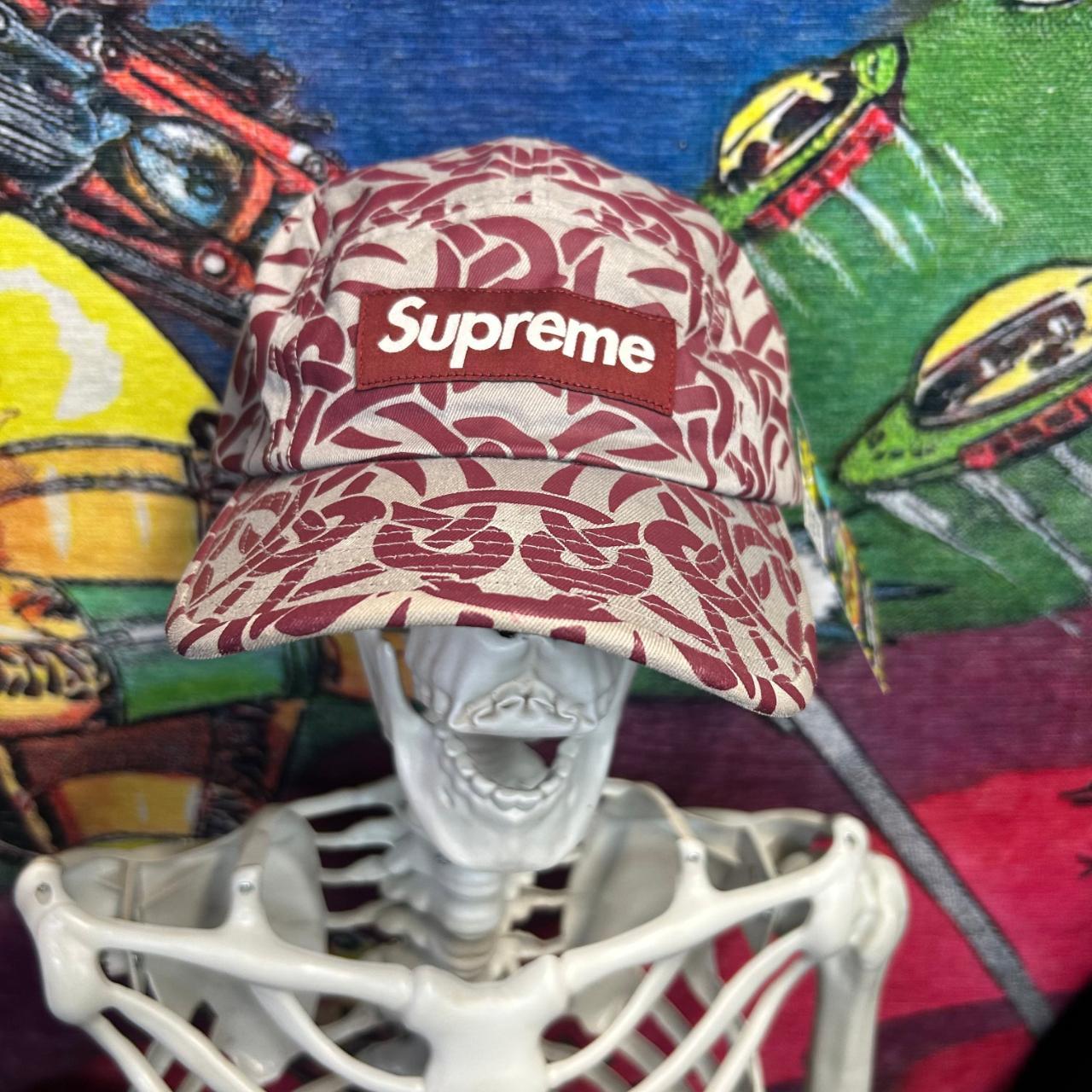 This Supreme cap features a crazy all over print