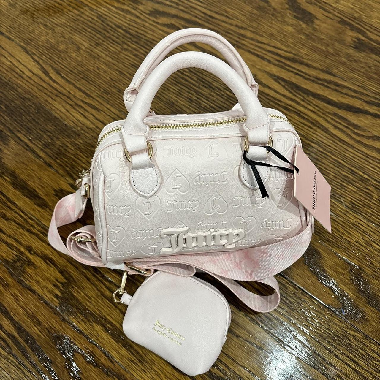 Juicy Couture baby selling pink bag purse