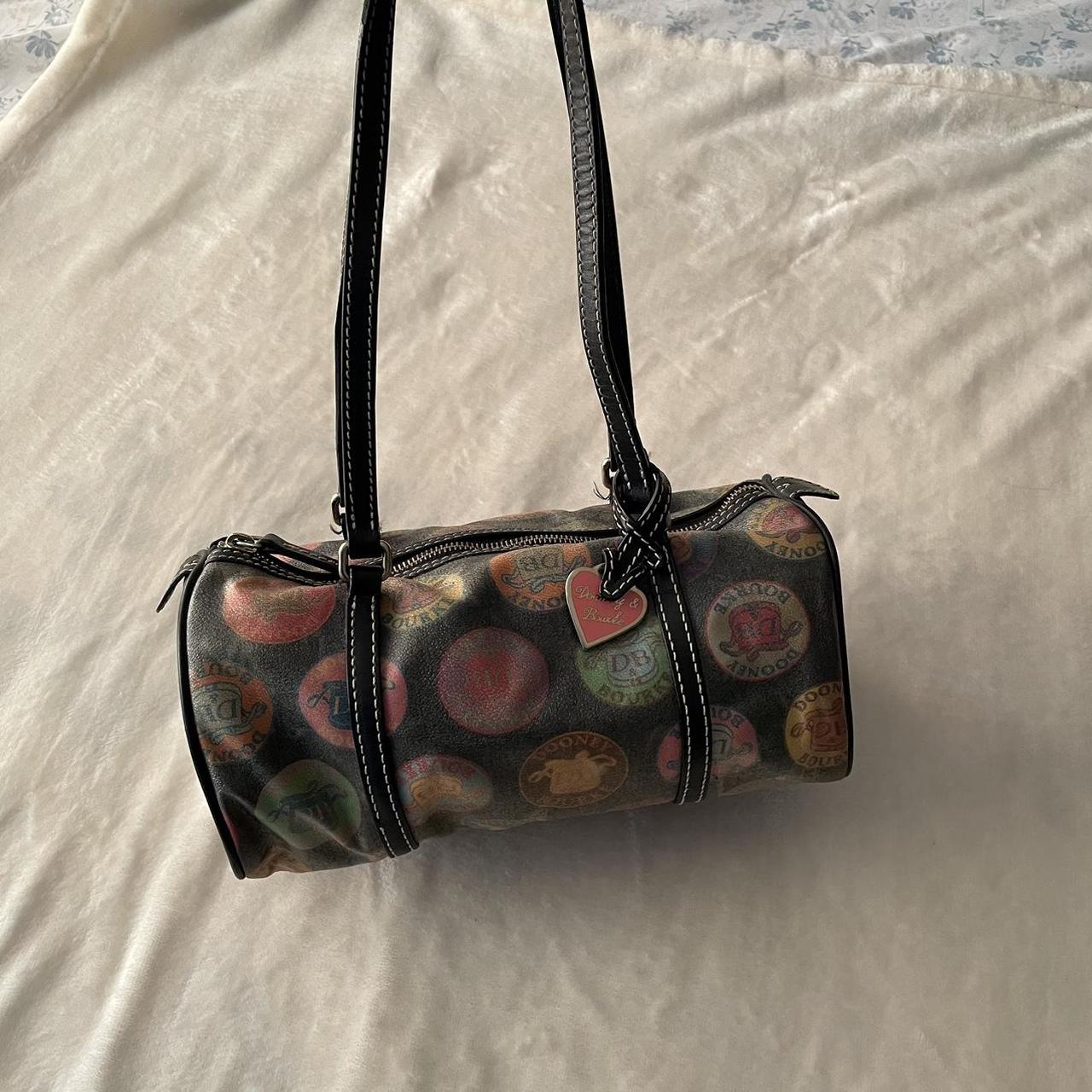 dooney and burke barrel bag does have wear dooney... - Depop