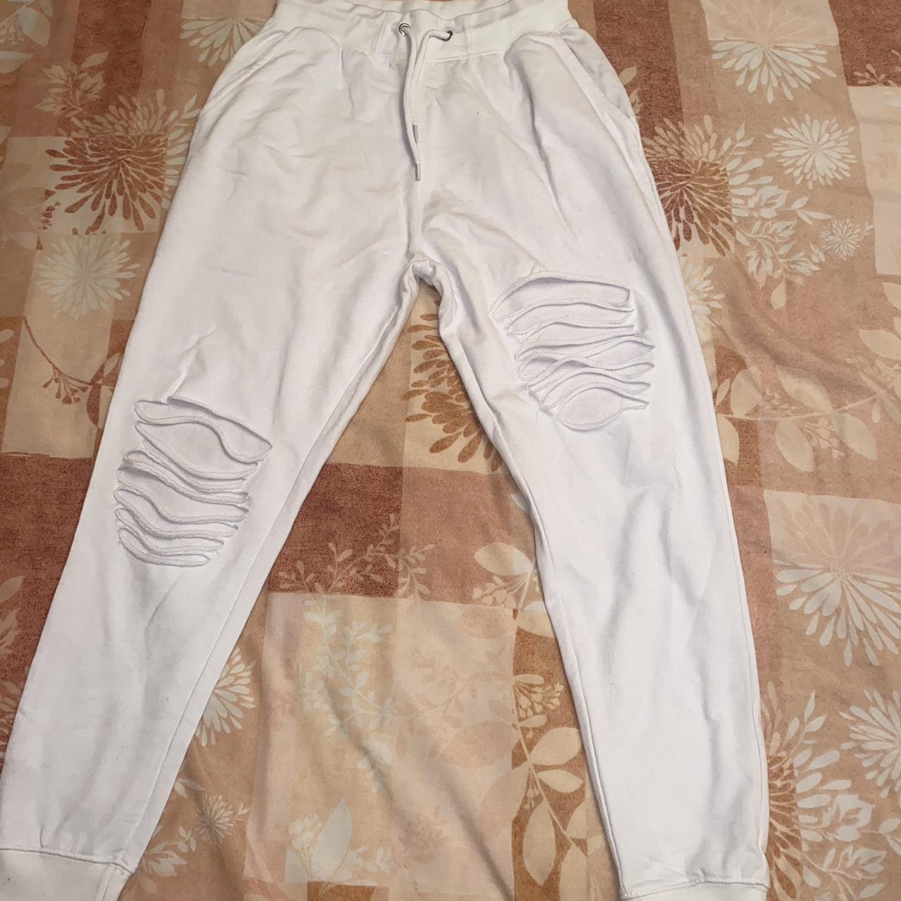 White sales ripped sweatpants