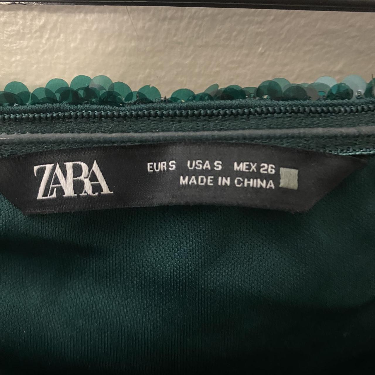 This is a Dark green Zara sequin bodysuit in size