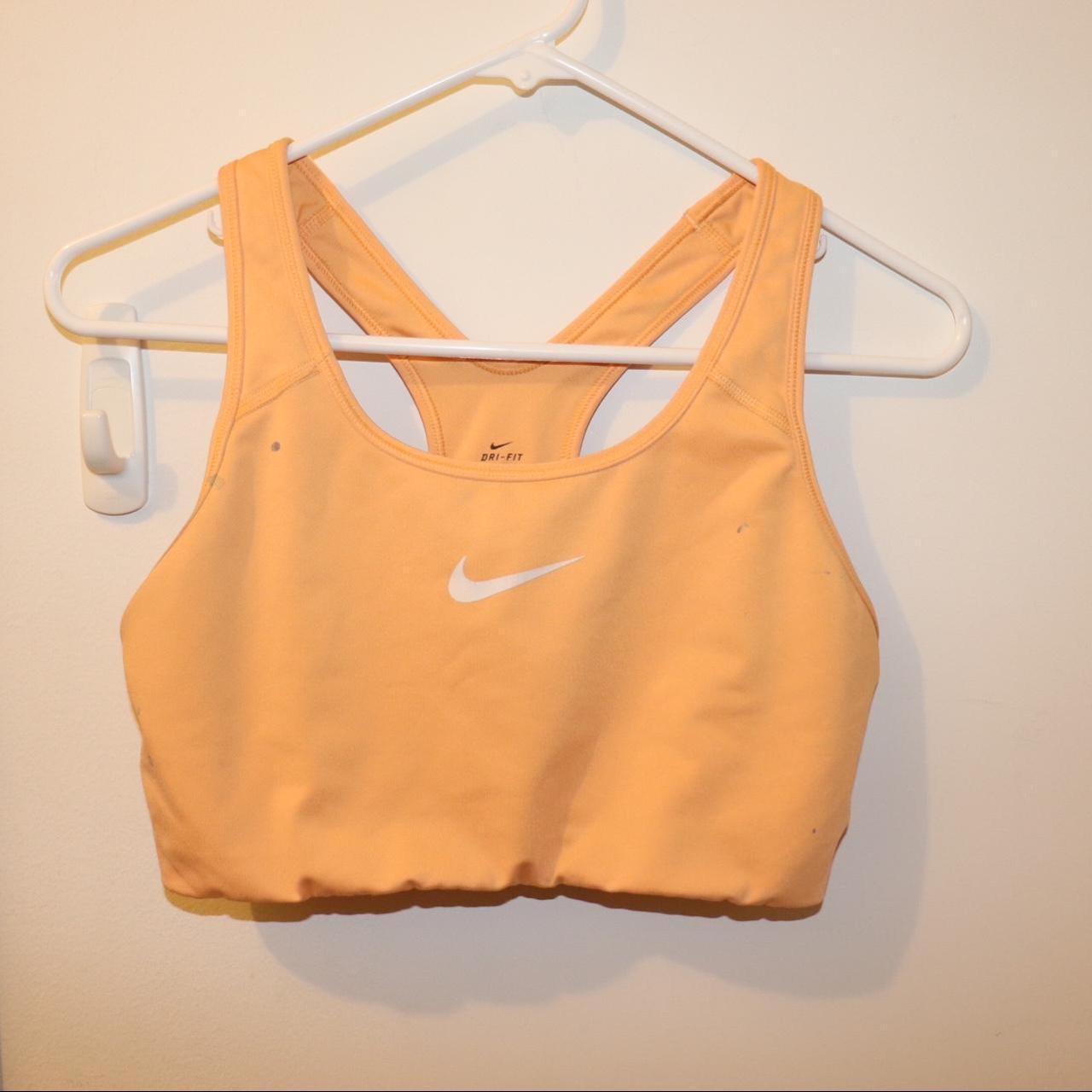 nike sports bra, has a couple paint marks light... Depop