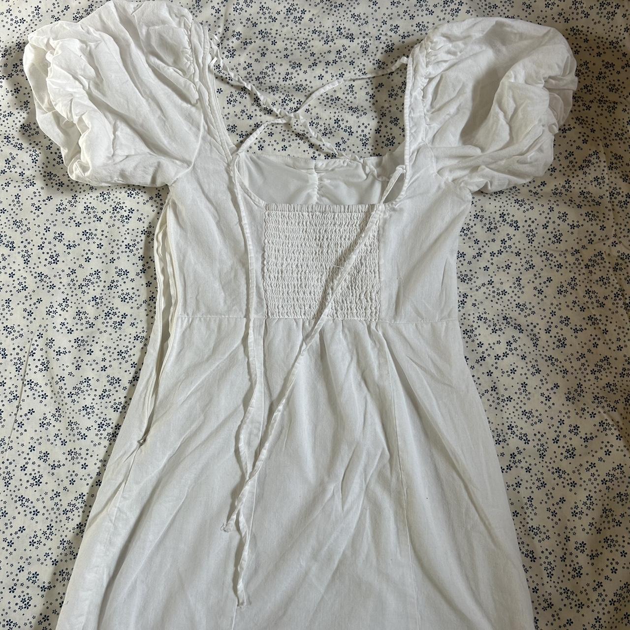 White casual mini dress with puffy sleeves. Worn... - Depop