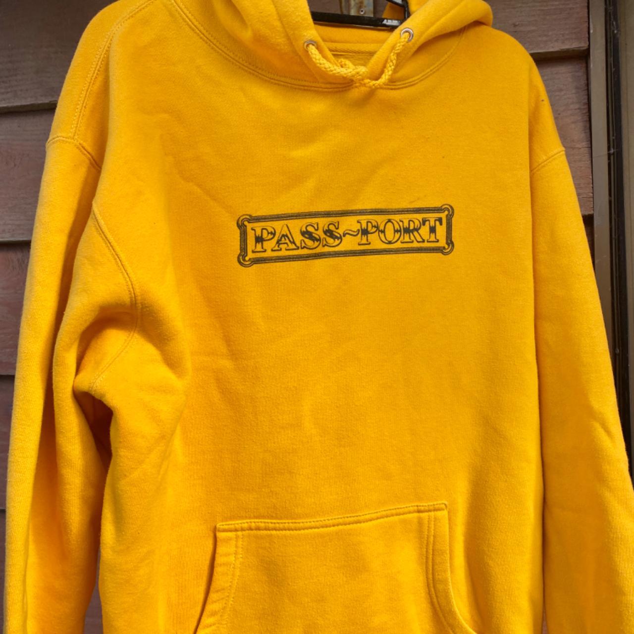 Oversized Passport brand hoodie Colour is mustard... - Depop