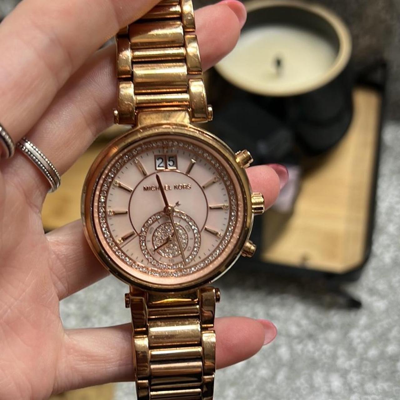 Michael kors sawyer watch rose gold hotsell