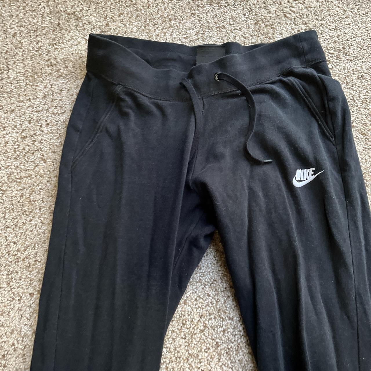 black nike joggers worn a lot but still in great... - Depop