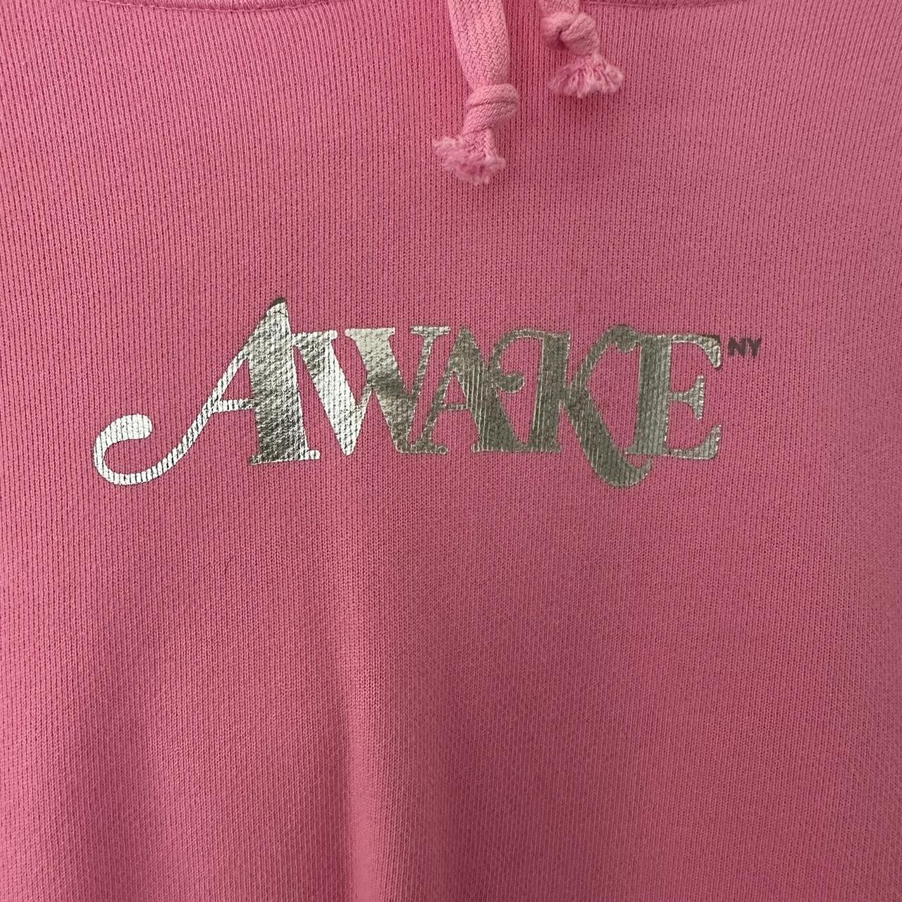 AWAKE NY FOIL HOODIE, SIZE LARGE MEN, SLIGHT STAIN...