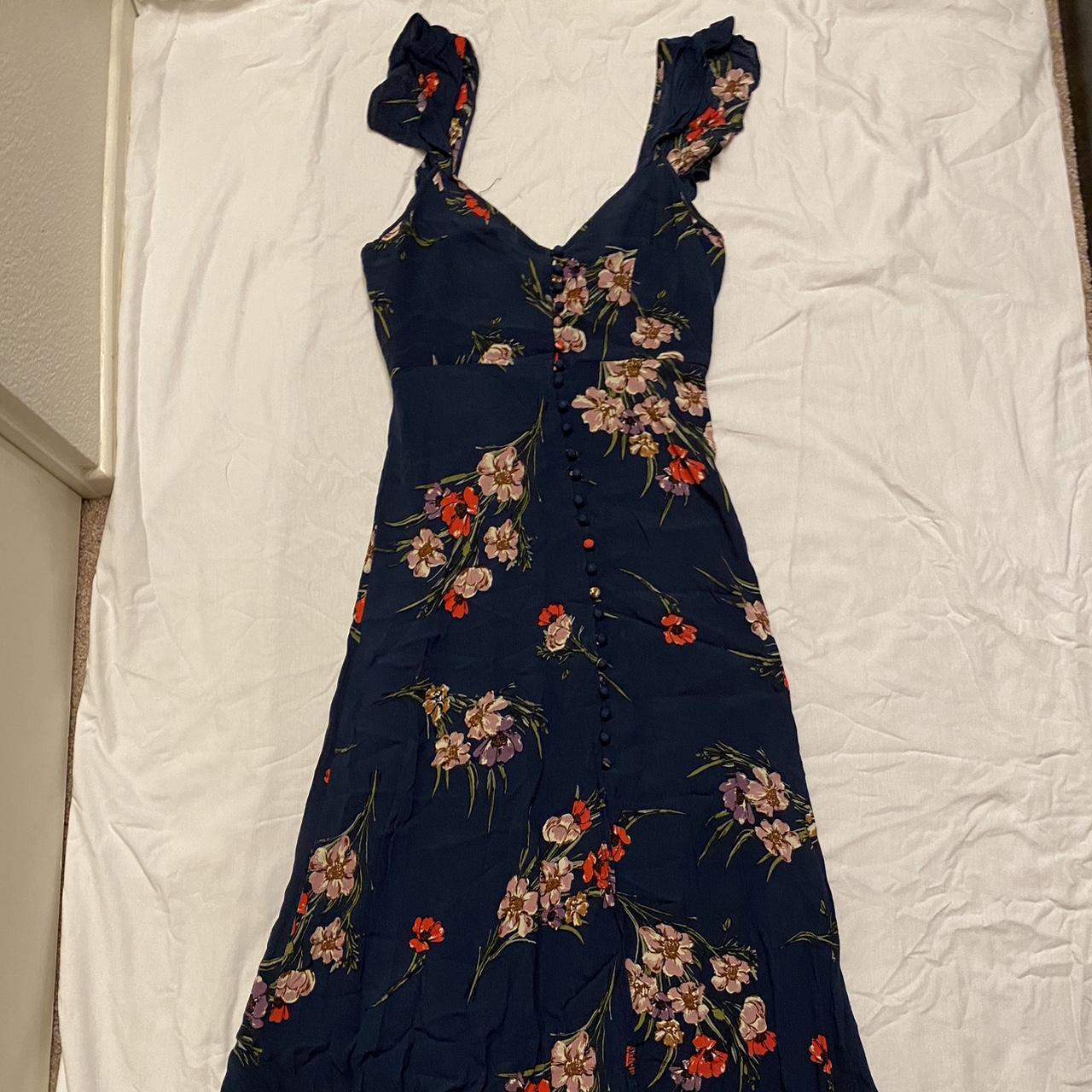 Navy blue floral tea dress. Ruffle sleeves and... - Depop