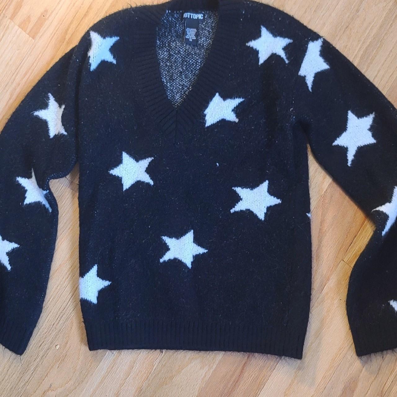 Hot Topic Star Sweater, says XS but fits up to a... - Depop