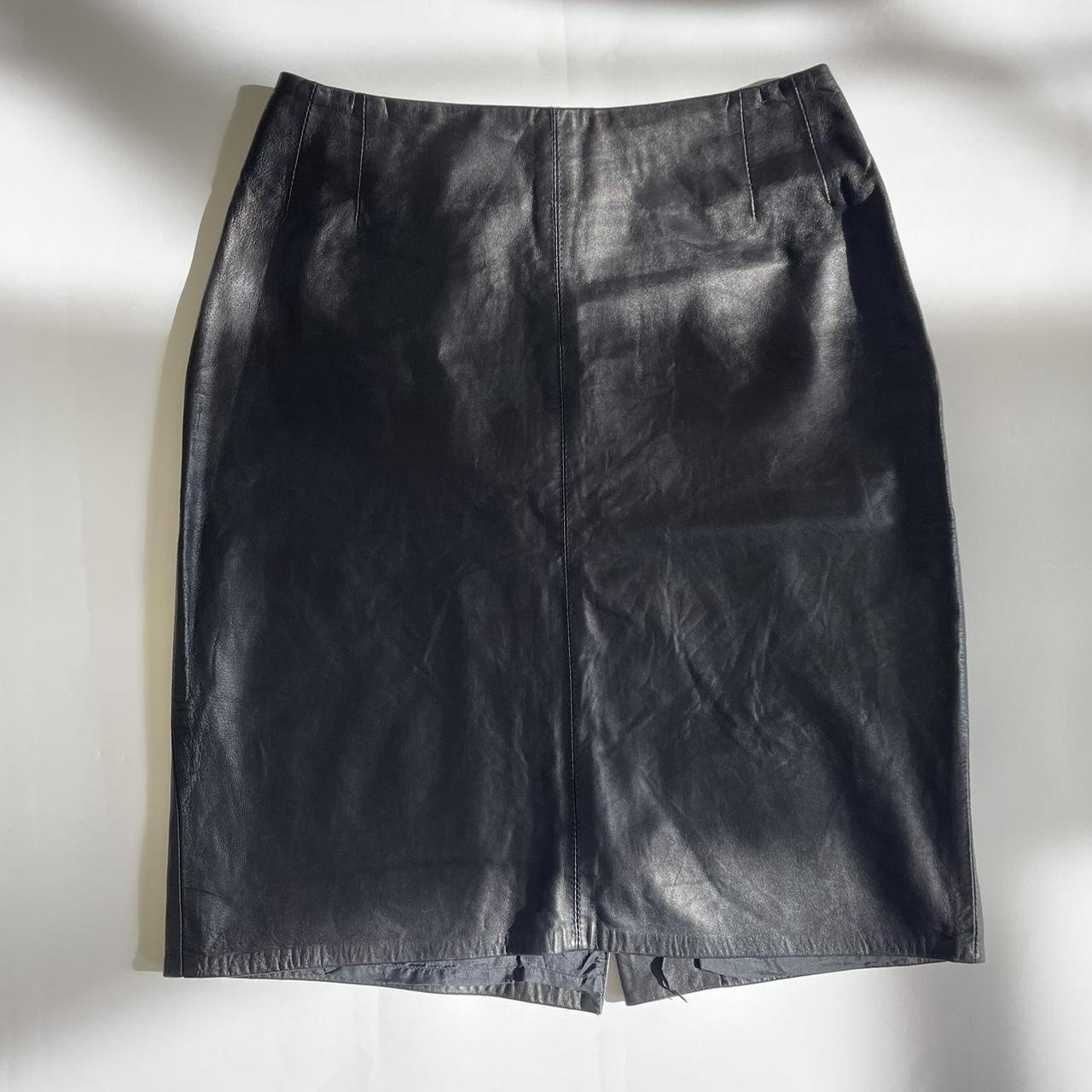 Black leather skirt super cute and great quality. It... - Depop
