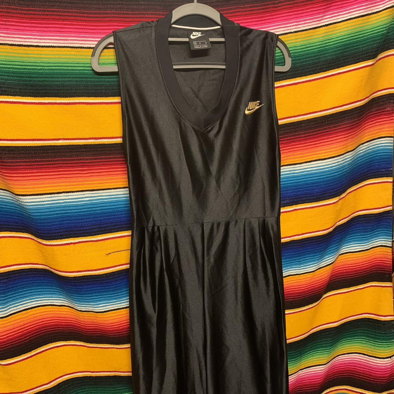 Gold on sale nike jumpsuit