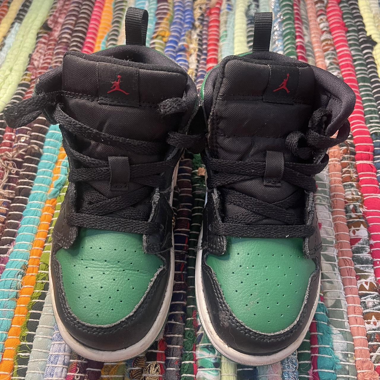 Jordans black 2024 red and green