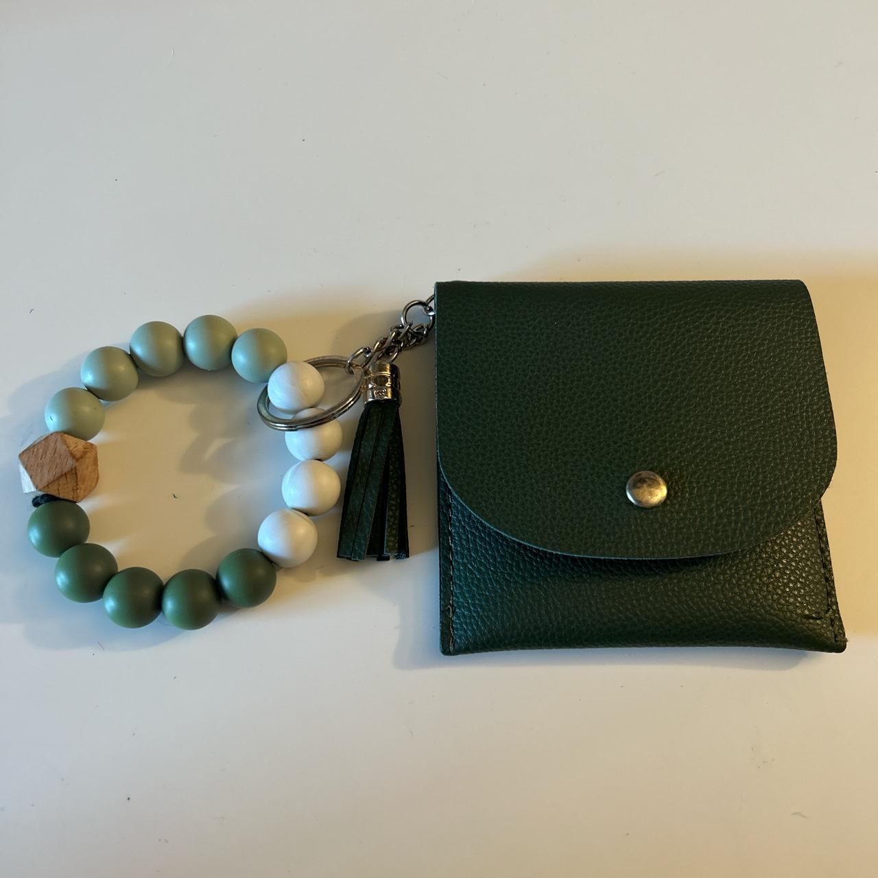 Green wallet with cute holding bracelet Barely used - Depop