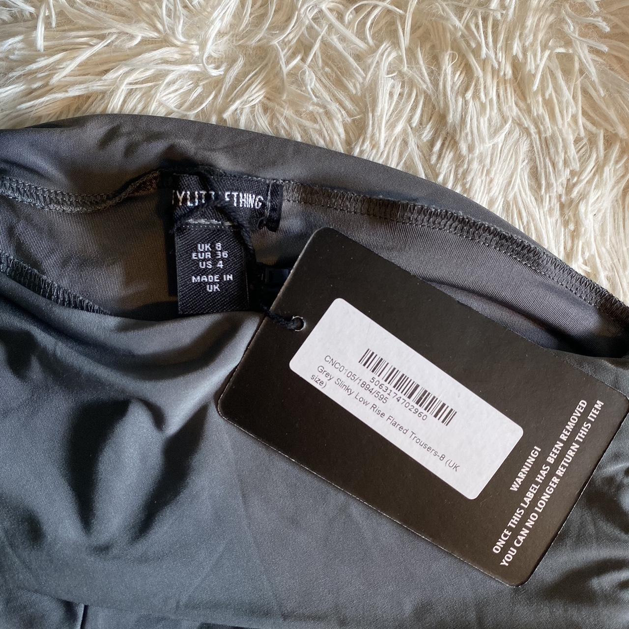 Plt grey slinky flares,, new with tags,, selling bc... - Depop