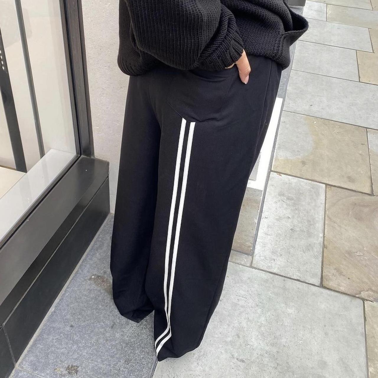 Sisters & seekers black joggers with stripe detail,... - Depop