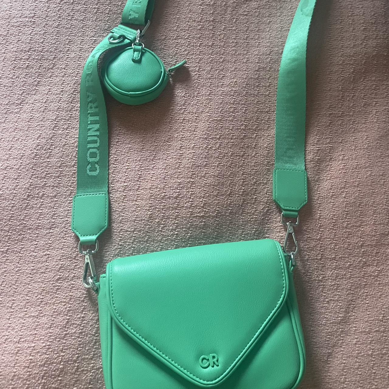 Green country road shoulder bag with silver hardware... Depop