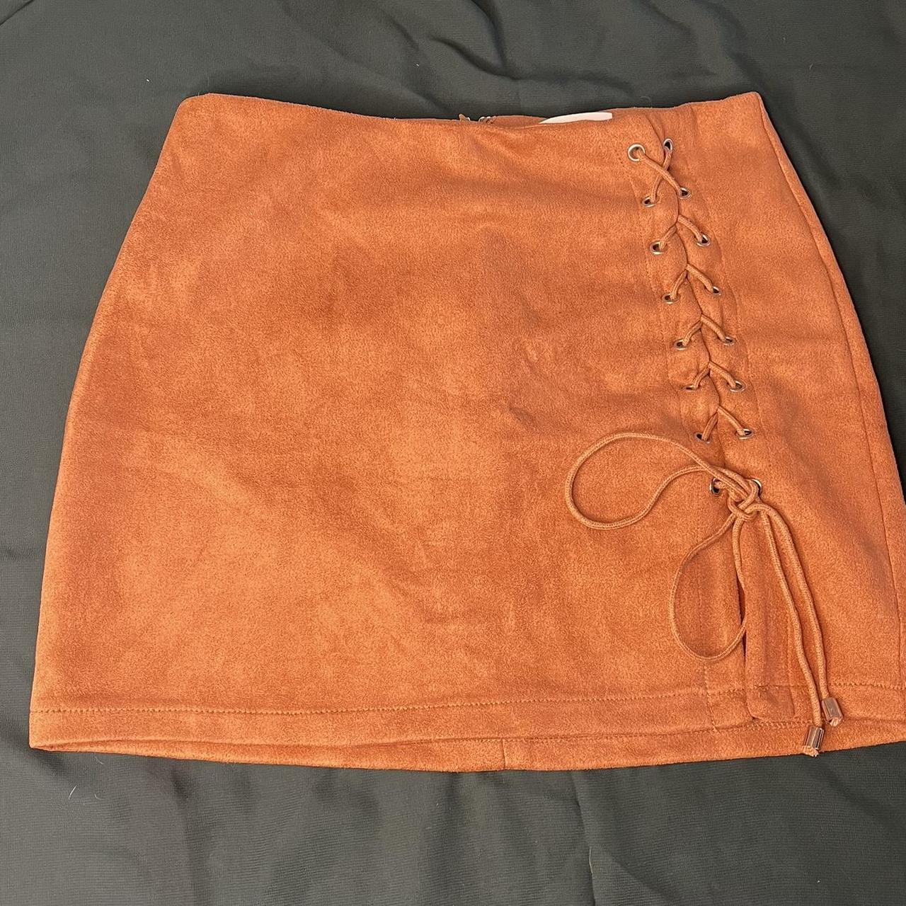 Light brown brown suede skirt With side tie strings... - Depop