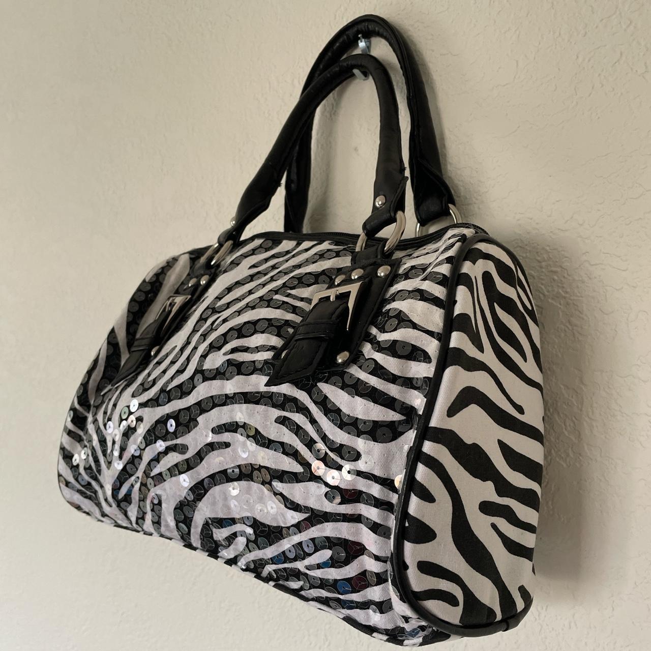 Black and white zebra print purse. By Chateau. Clear