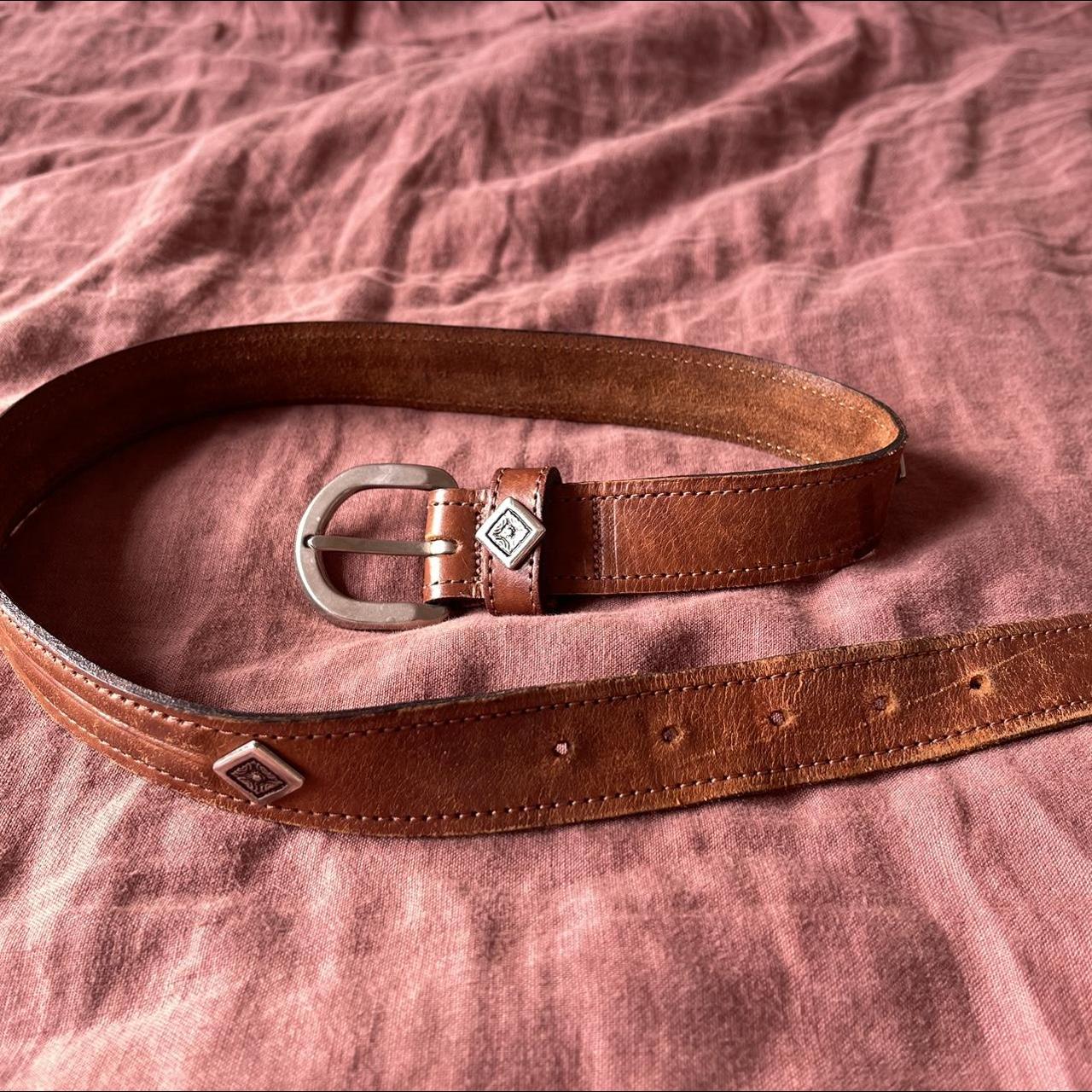 Vintage Country Road belt has a few marks on the... Depop