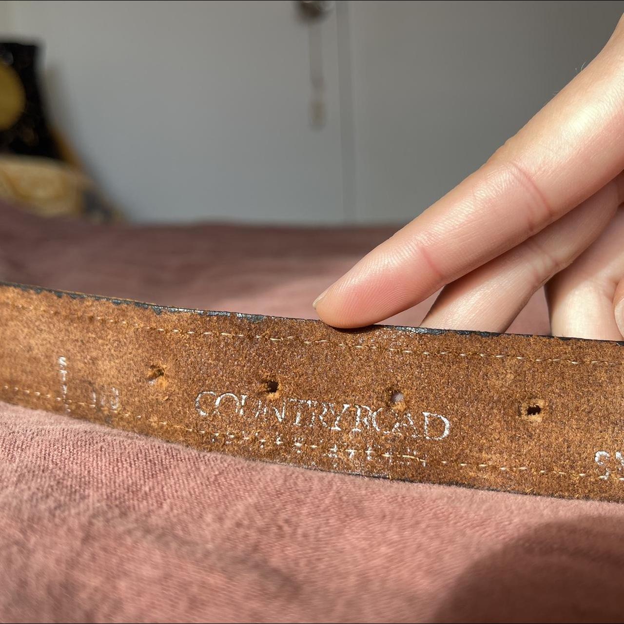 Vintage Country Road belt has a few marks on the... Depop
