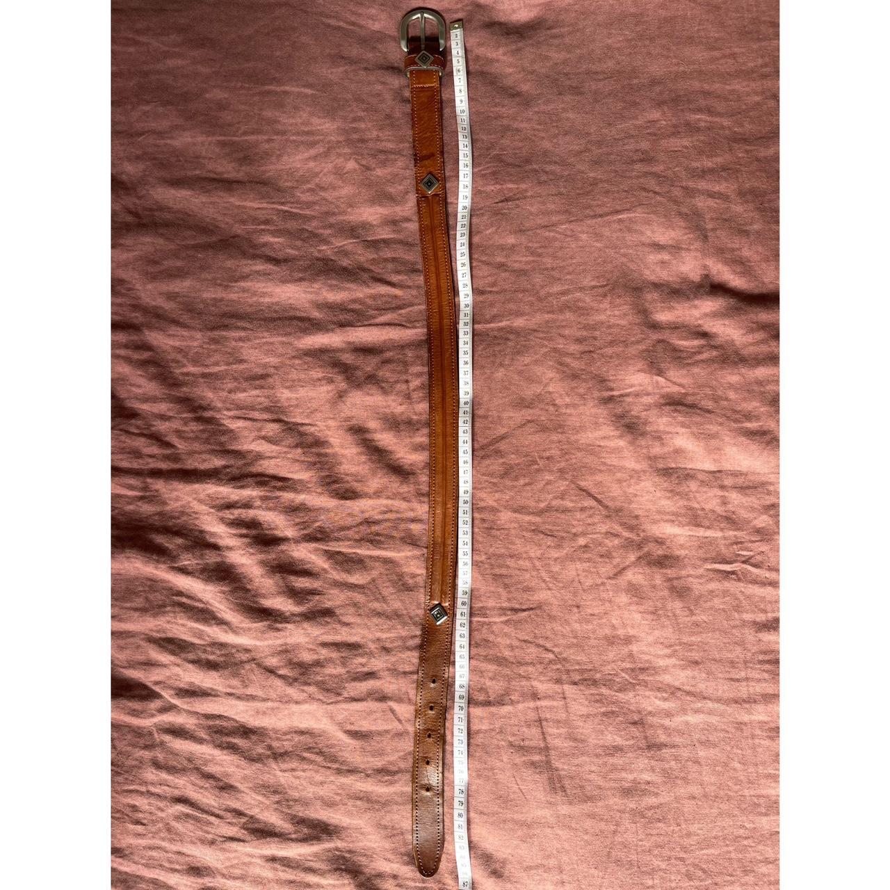 Vintage Country Road belt has a few marks on the... Depop