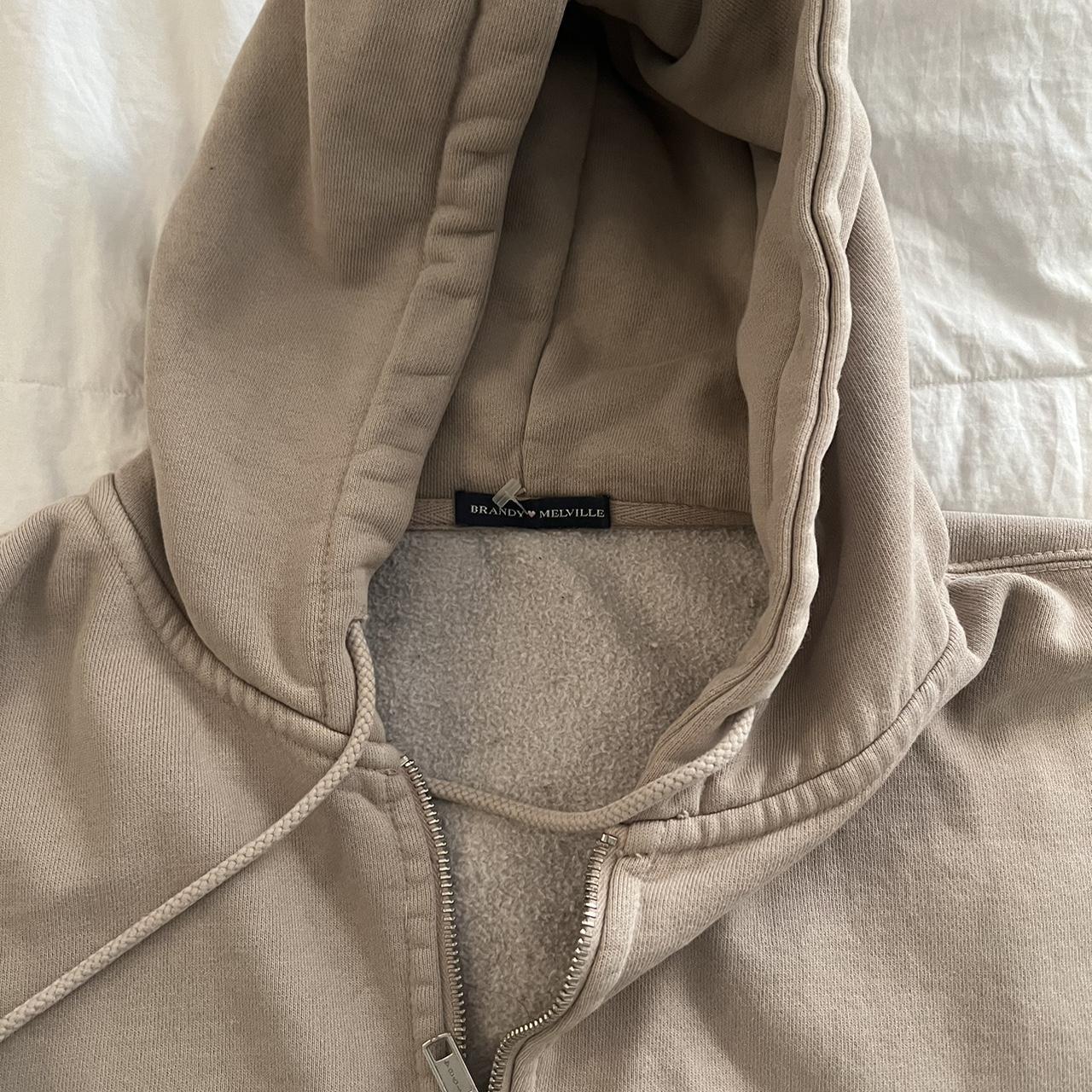 Oversized brandy hoodie minor bleach stain on under... Depop