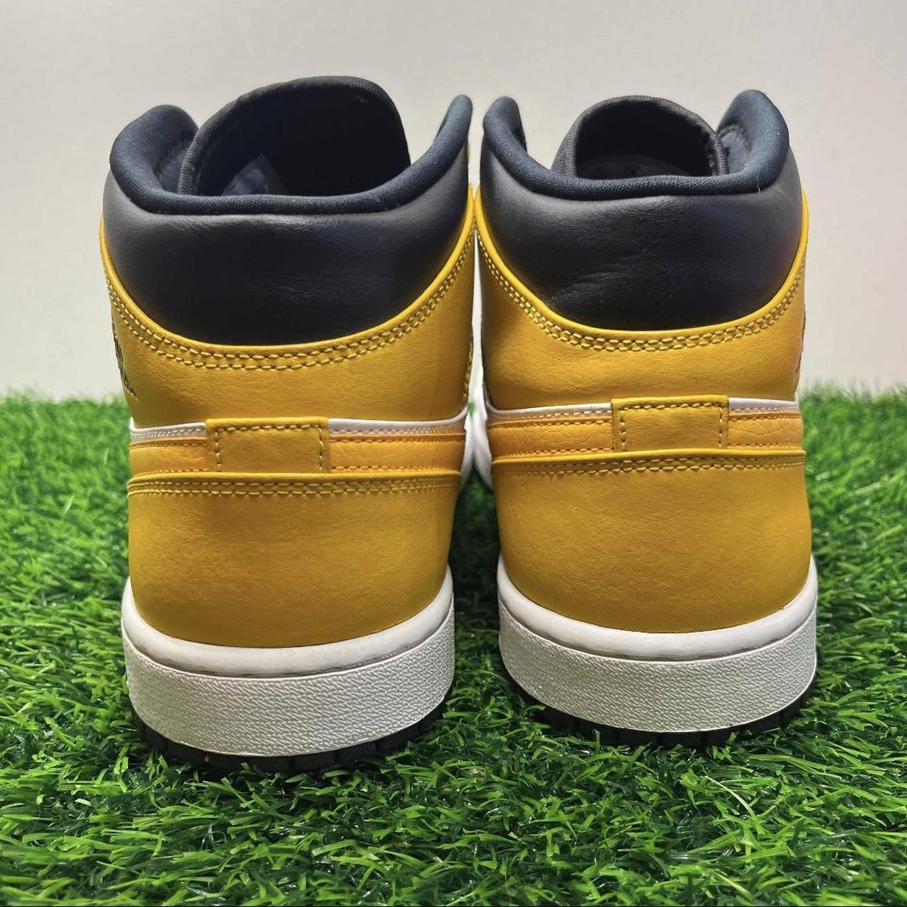 yellow university jordans