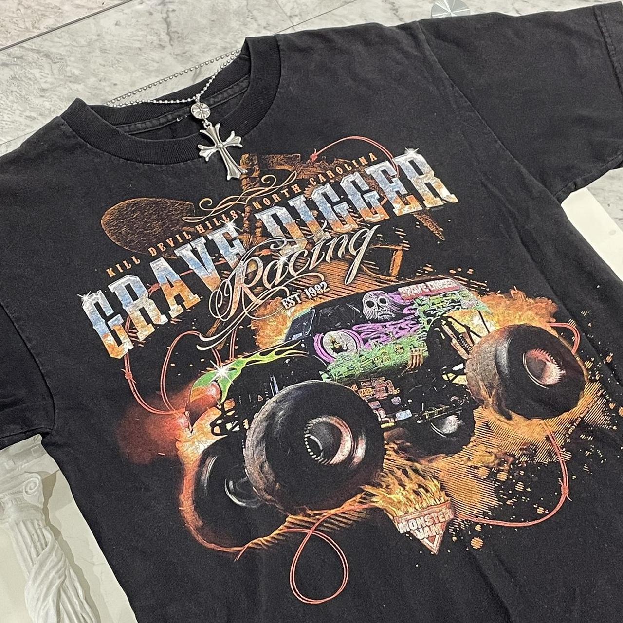 Kill Devil Hill North Carolina Grave Digger Graphic Tee offers