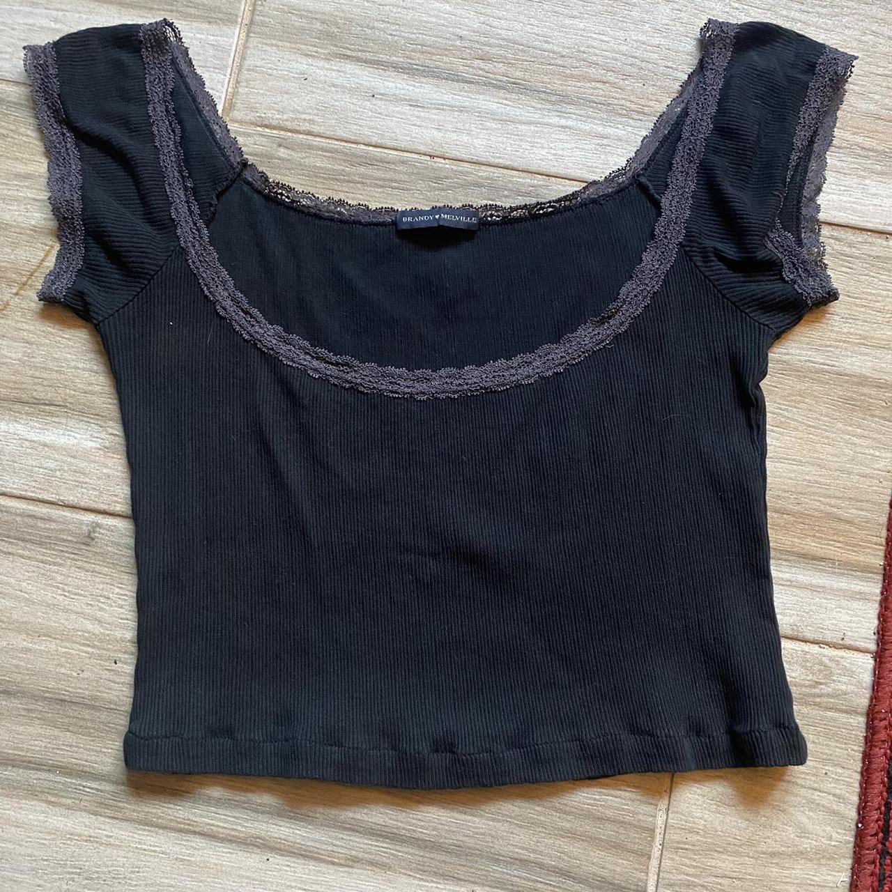 Brandy Melville Eden Top in Black Rare cropped fit,... Depop