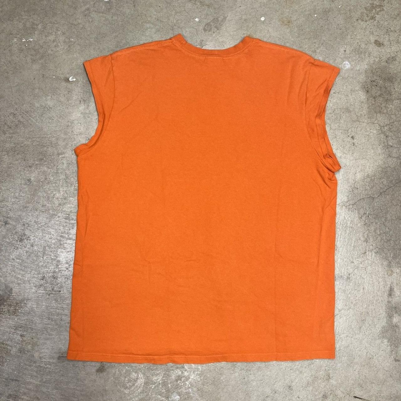 rugged orange nike shirt